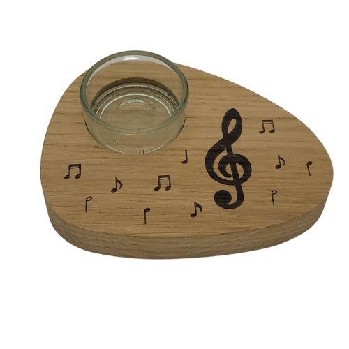 Tea light holder with treble clef and notes