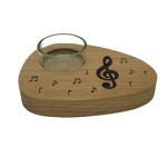 Tea light holder with treble clef and notes